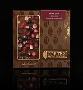 Czekolada mleczna 33,6% z miodem i porzeczkami 85g